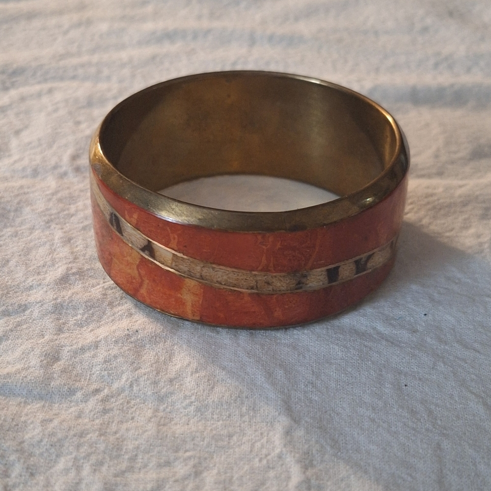 Coral and brass bangle